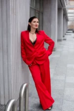 Red suit with a collarless jacket and palazzo trousers